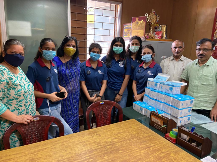 Students from Vidyashilp Academy donate face masks to Government schools